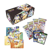 Geöffnete Pokémon Prismatische Entwicklungen Überraschungsbox – deutsche Version – Inhalt mit Karten, Boosterpacks und schillerndem Evoli-Motiv auf bunter Verpackung